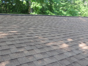 When the shingles are nailed together, the people in the house, stay dry during storms.